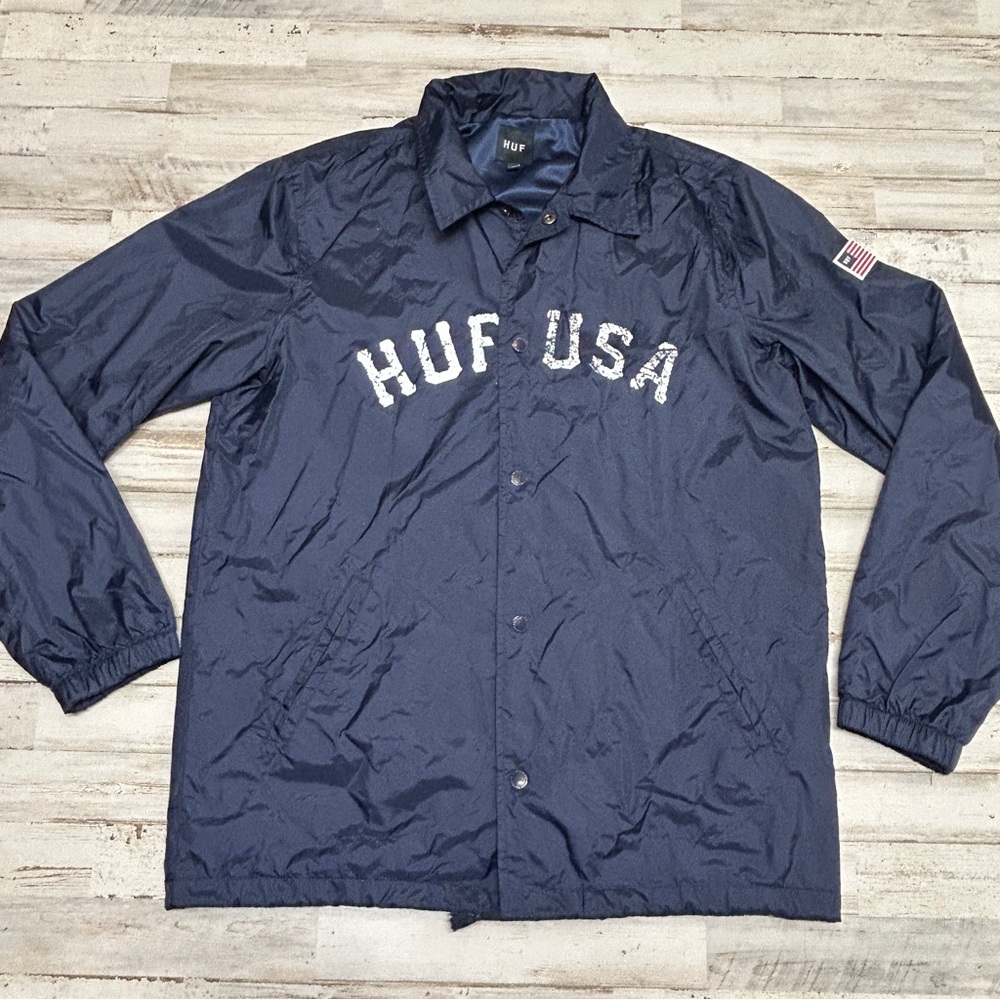 Huf Jacket Men’s Medium USA Blue Windbreaker Neck pocket Coach Logo Skateboard